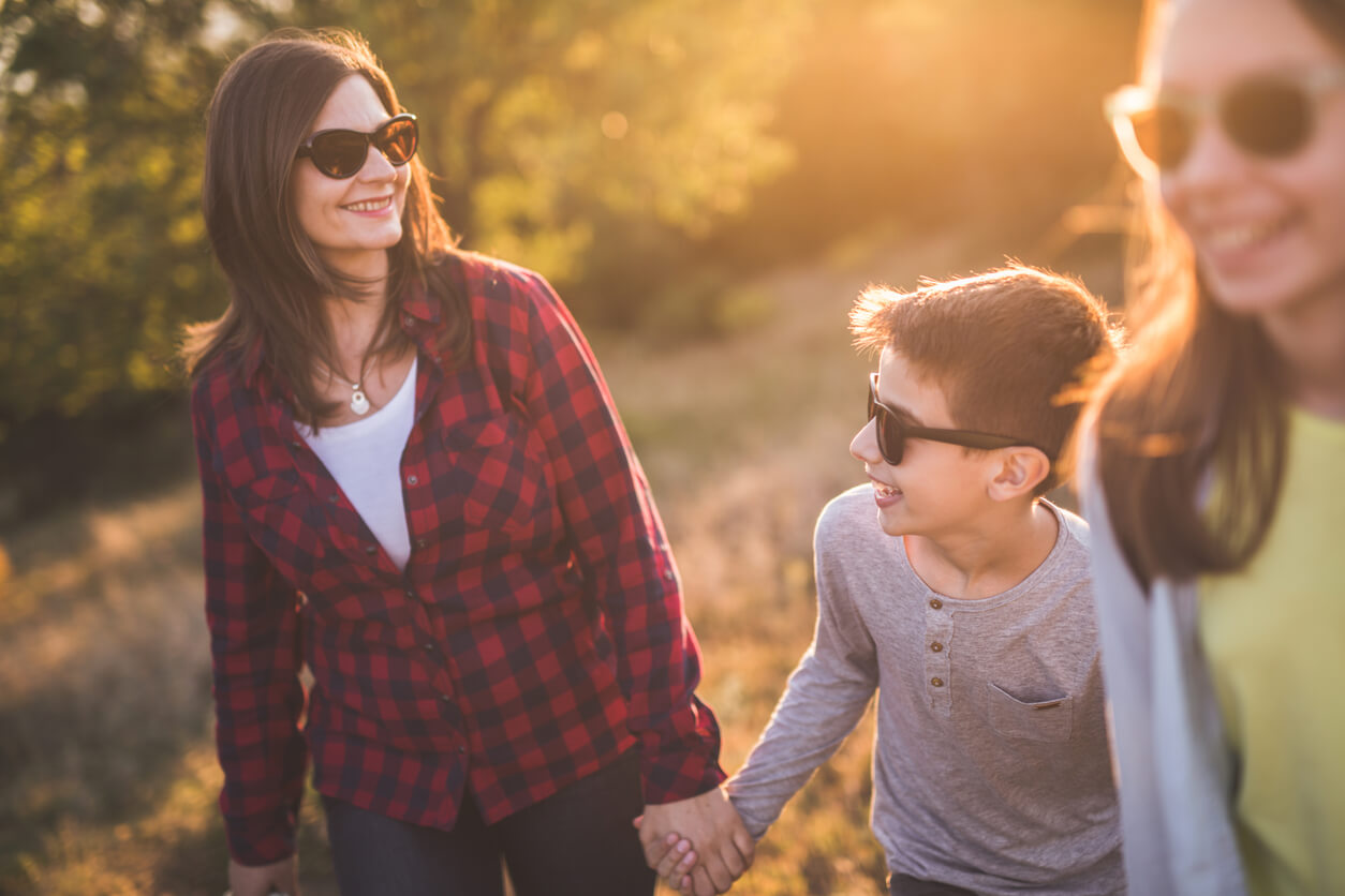 An image of a happy family for their representation in a court by a family law firm melbourne.