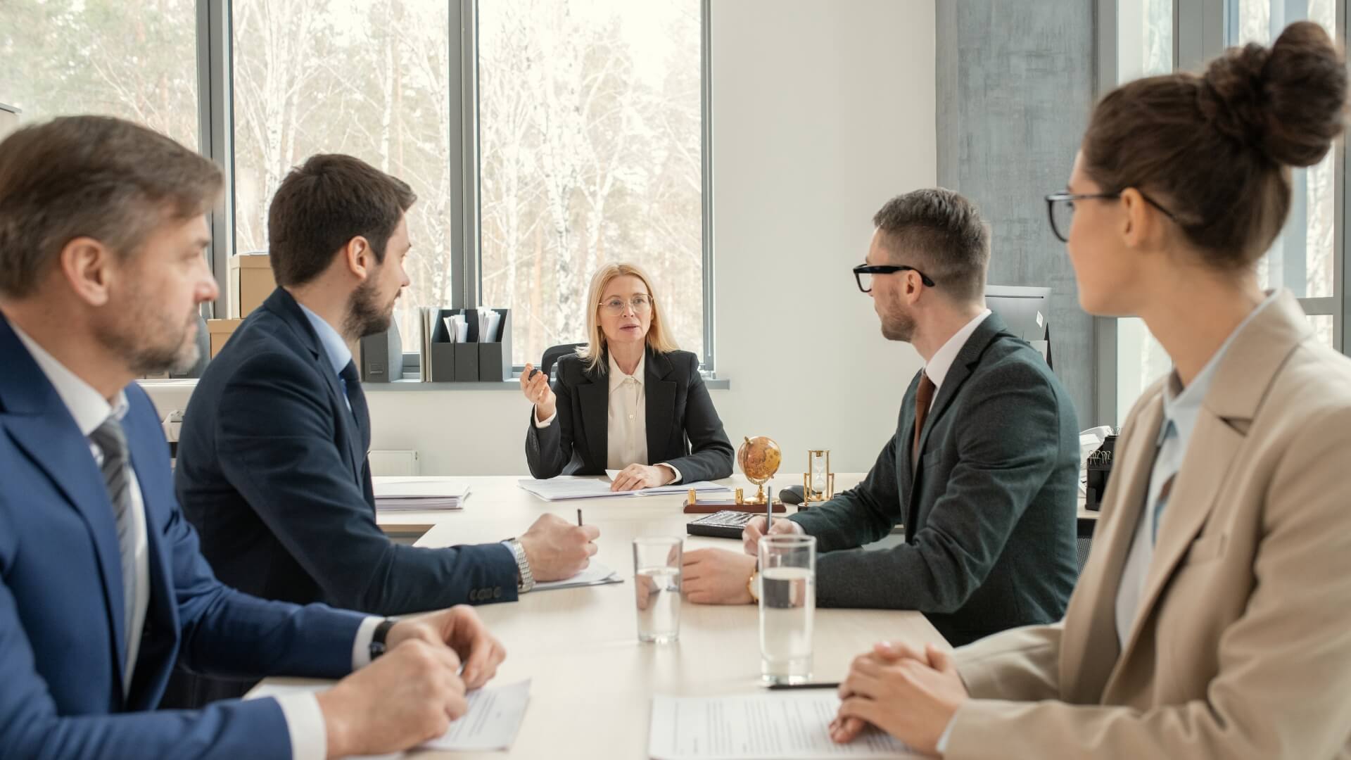 An image of assault lawyers melbourne in a law firm discussing a case.